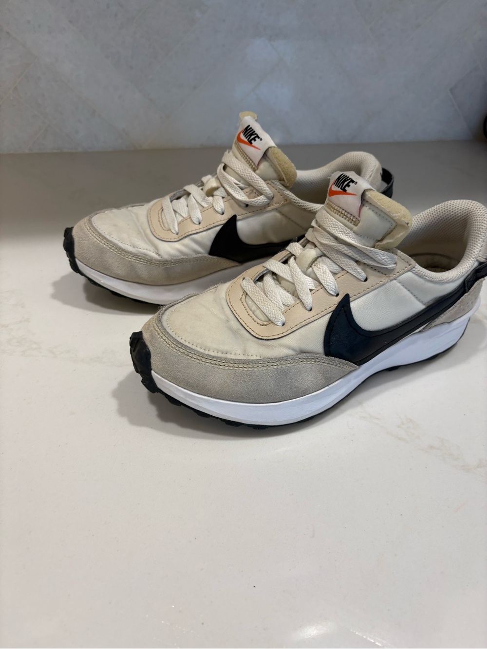 Woman’s Nike Cream & Black Casual Sneakers